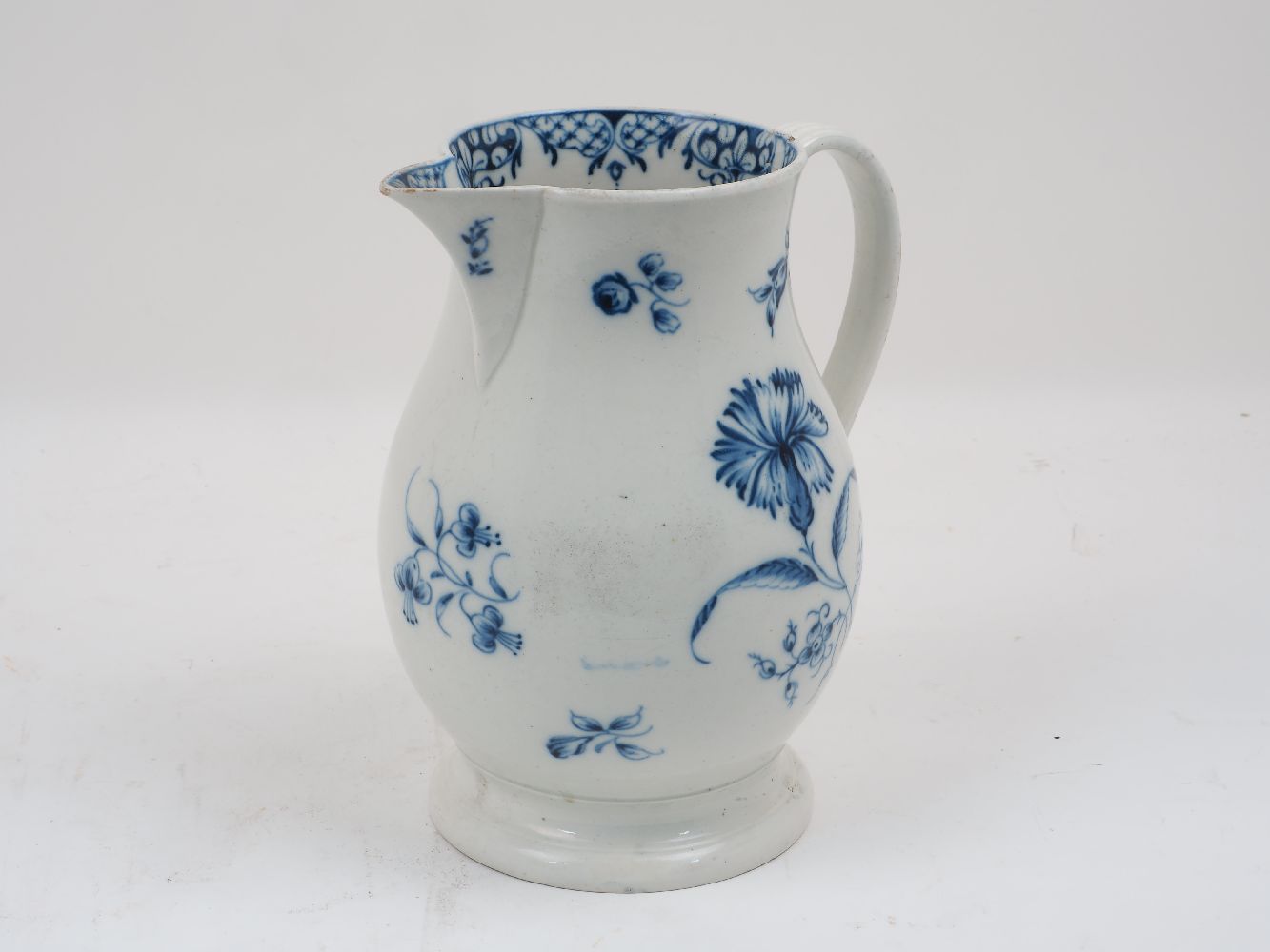 Lot 30: AMENDMENT. Please note that the lot should read ‘A blue and white porcelain jug of baluster