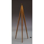 A modern ash tripod floor lamp, of recent manufacture, with three splayed and tapering legs, 138cm