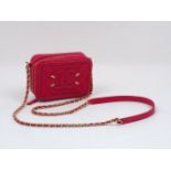 A Chanel clutch bag, the rectangular form red leather body designed with Chanel logo and matelassé