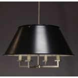 A modern pendant ceiling light, of recent manufacture, with four lights, the tapered black shade