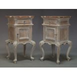 A pair of reproduction Louis XV style bedside cupboards, of recent manufacture, with red and white