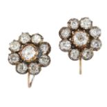 A pair of 19th century gold and silver mounted diamond cluster earrings, each of old-brilliant-cut