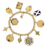 A gold curb-link charm bracelet suspending various Imperial Russian and English gold charms, some