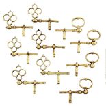 A group of ten 19th century gold watch keys, of 'T-bar' form with loop or openwork quatrefoil