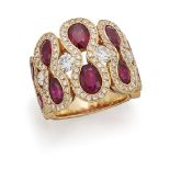 A French, ruby and diamond dress ring, the front composed of a series of graduated 'figure-of-eight'