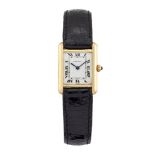 An 18ct gold 'Tank' quartz wristwatch by Cartier, the rectangular white dial with Roman numerals and