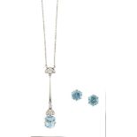 An aquamarine and diamond necklace and a pair of blue zircon earstuds, the necklace with cut-