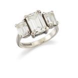 An 18ct gold, diamond three stone ring, the centre rectangular-cut diamond weighing approximately