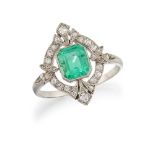 A French Belle Epoque, platinum, emerald and diamond cluster ring, the rectangular-cut emerald