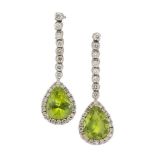 A pair of 18ct. gold, peridot and diamond earrings, each with a triangular-shaped peridot single