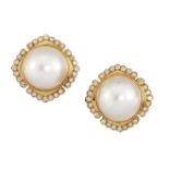 A pair of cultured pearl and diamond earclips, by Larry, the domed mabe cultured pearl centres to