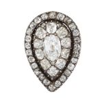 An early 19th century diamond set brooch, of pendeloque cluster form, centrally set with an oval old