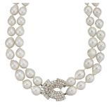 A cultured pearl and diamond necklace, the two rows of baroque shaped cultured pearls, approximate