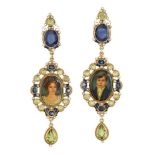 A pair of sapphire and peridot portrait drop earrings, by Percossi Papi, the miniature stylised