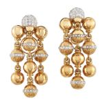 A pair of diamond ball drop chandelier earrings, the rounded pave diamond tops to three fringes of