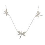 An 18ct white gold and diamond dragonfly necklace, the three pave set diamond dragonflies