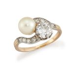 A late 19th early 20th century diamond and pearl crossover ring, the old-brilliant-cut diamond and