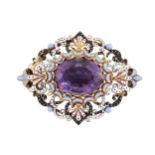 A 19th century gold and enamel amethyst brooch in the style of Robert Phillips, the central amethyst