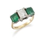 An 18ct gold, emerald and diamond three stone ring, the rectangular princess-cut diamond between