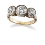 A diamond three stone ring, the three old brilliant-cut diamonds in collet mounts to a plain hoop,