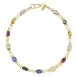 A vari-coloured sapphire bracelet, composed of various shades of pink, green, yellow, blue and