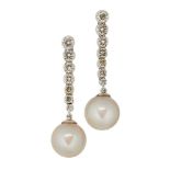 A pair of 18ct. gold, cultured pearl and diamond earrings, each with single cultured pearl drop,