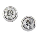 A pair of diamond earstuds, the brilliant-cut diamonds in collet mounts, approximate spread of