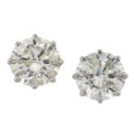 A pair of diamond single stone earstuds, the brilliant-cut diamonds in claw mountsPlease refer to