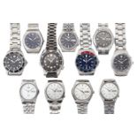 A group of nine stainless steel wristwatches by Seiko, comprising: six various automatic day date