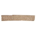 A fragment of a wooden beam with Kufic inscription, possibly North Africa, 11th century, 53.5cm,