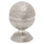 A silver marriage casket, Malaysia, late 19th century, of spherical form in two halves and on