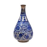 A Timurid blue and white pottery bottle, Iran, 15th century, of large drop form rising to a small