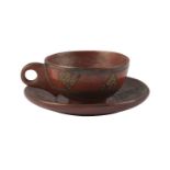 A Tophane ware pottery cup and saucer, Turkey, 19th century, red earthenware with gilt decoration,