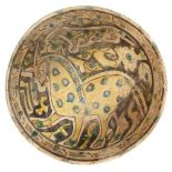 A Nishapur buffware pottery bowl with horse, North East Iran, 10th century, of hemispherical form on