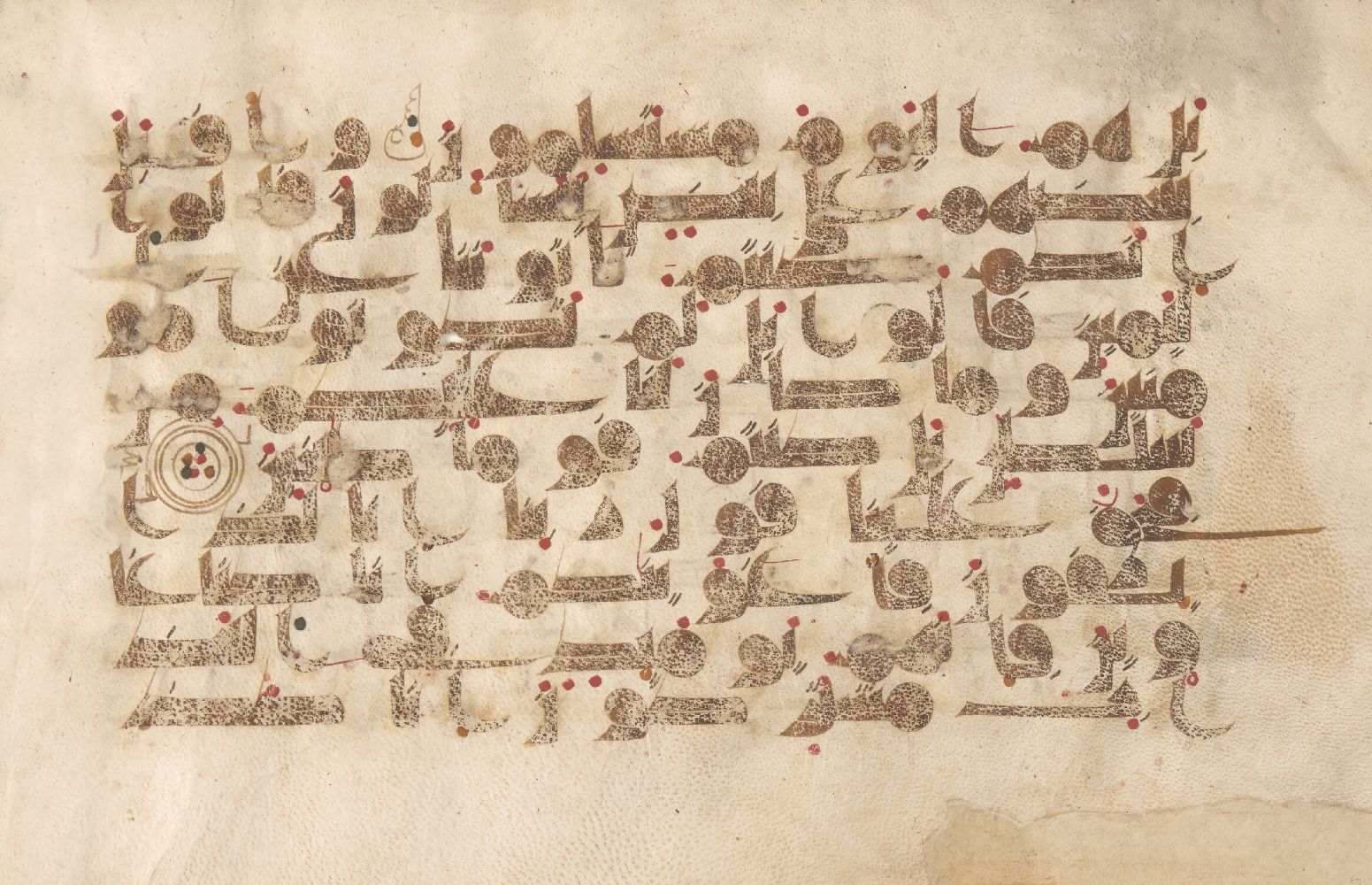 A Kufic Qu'ran folio, probably Umayyad Al-Andalus, 10th century, Qur'an XXXVII (sura al-saffat),