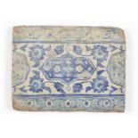 A Damascus Iznik tile, Syria, circa 1530, of rectangular form, underglaze painted in cobalt and