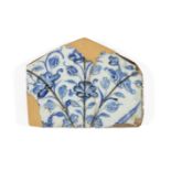 A Mamluk Damascus tile fragment, 15th-16th century, the white ground decorated with cobalt-blue