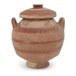A Messapian pottery lidded stamnos, circa 4th century BC., the lid with banded decoration in red and