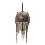 A Qajar silver overlaid steel helmet, late 19th century, of typical form, with central spike,