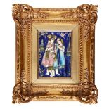 A Qajar moulded polychrome tile with couple drinking, Isfahan, Iran, 19th century, of rectangular
