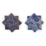 Two Ilkhanid Ladjvardina moulded pottery star tiles, Iran, late 13th century, moulded under the