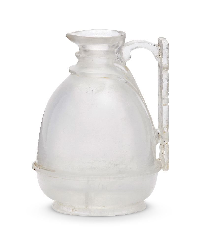 A small rock crystal ewer with carved handle, 19th-20th century, in an early 20th century fitted