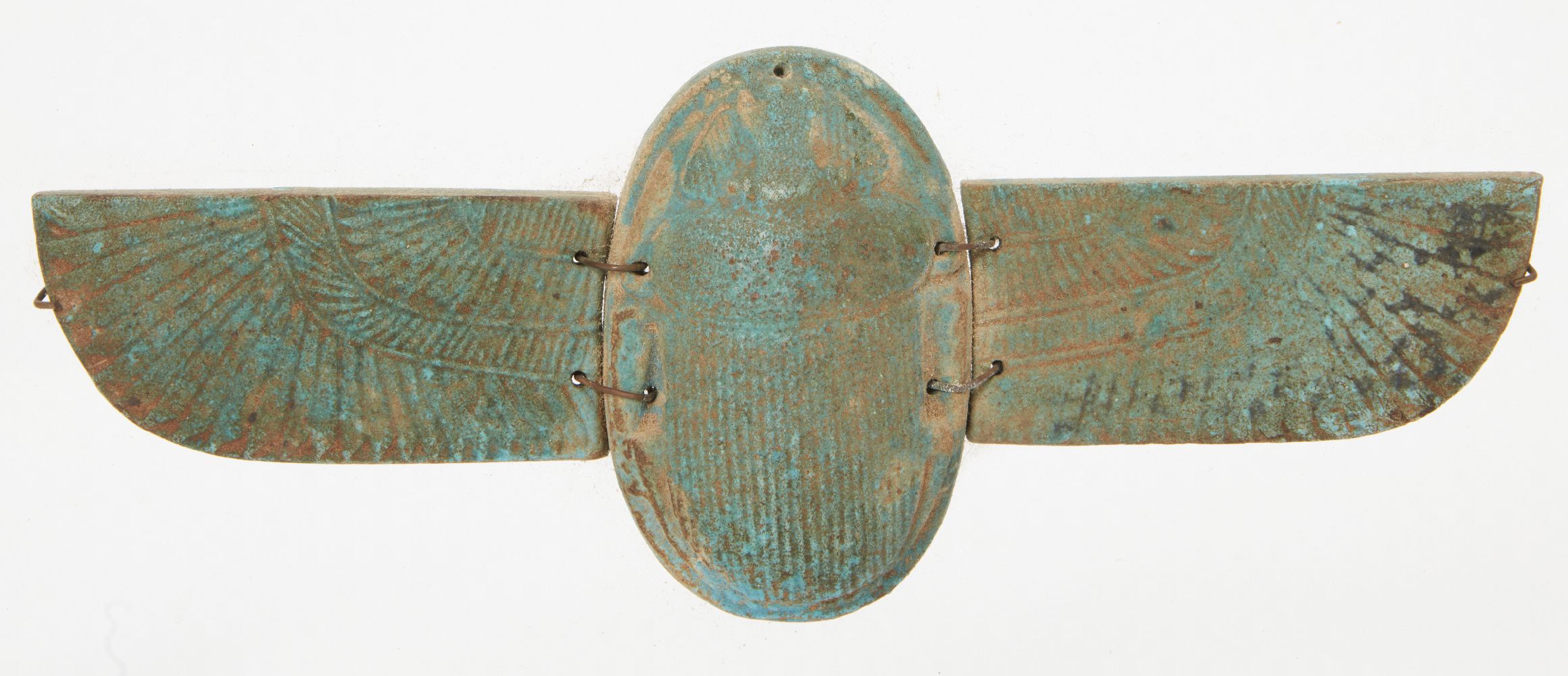 A large Egyptian-style blue faience winged scarab, the separately-made body and two wings perforated