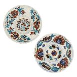 Two Kütahya polychrome pottery dishes, Turkey, second half 18th century, one painted underglaze in