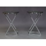 AMENDMENT: Please note VAT is charged on the hammer price for this Lot. A pair of chromed and glass