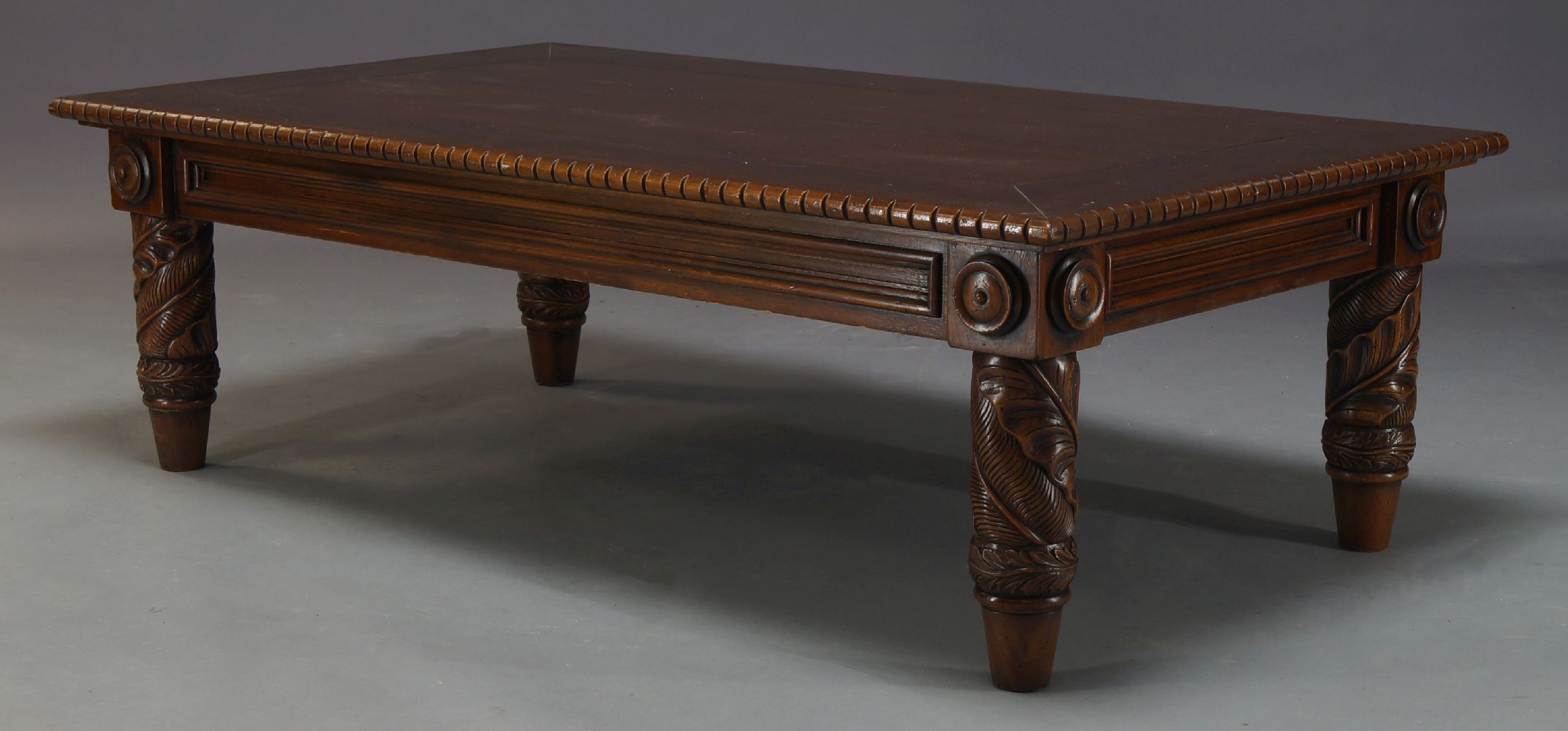 A mahogany coffee table by Polo Ralph Lauren, late 20th Century, the rectangular top on