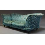 A large three seater sofa, upholstered in turquoise velvet and gold foliate pattern fabric, with