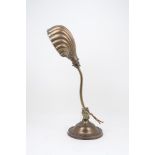 AMENDMENT: Please note VAT is charged on the hammer price for this Lot. A brass desk lamp, c. 1920