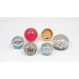 An extensive selection of paperweights to include: a Caithness (Scotland) '50' designed example,