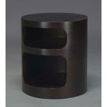 A modern stained bentwood side table, late 20th Century, of cylindrical form, with two open shelves,